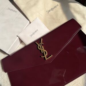Saint Laurent Dark Red Clutch with Gold Logo